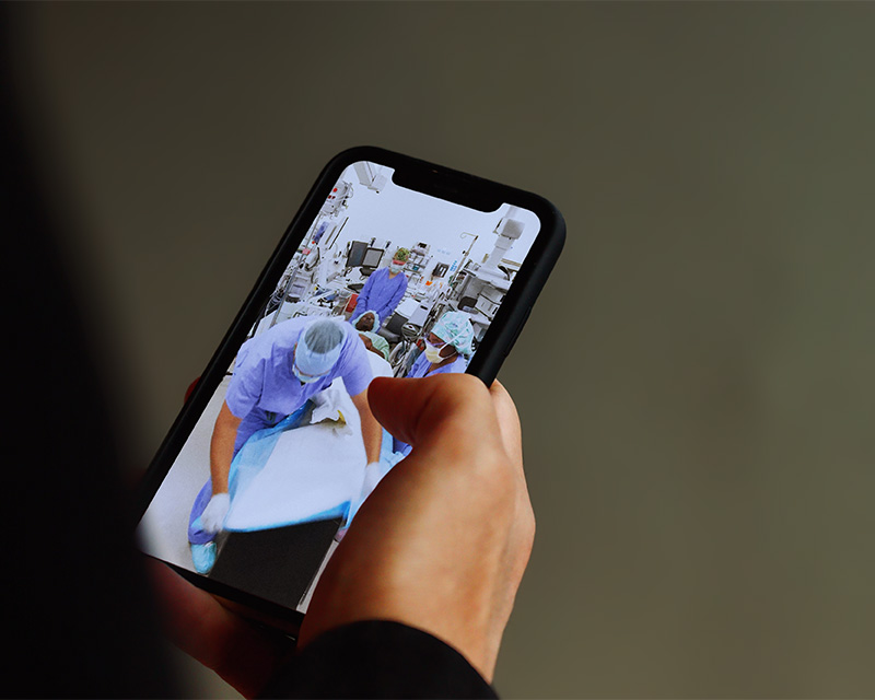 person-holding-phone Person holding phone.