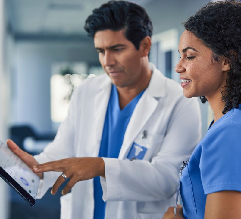 nurses-look-at-tablet Nurses look at tablet together.